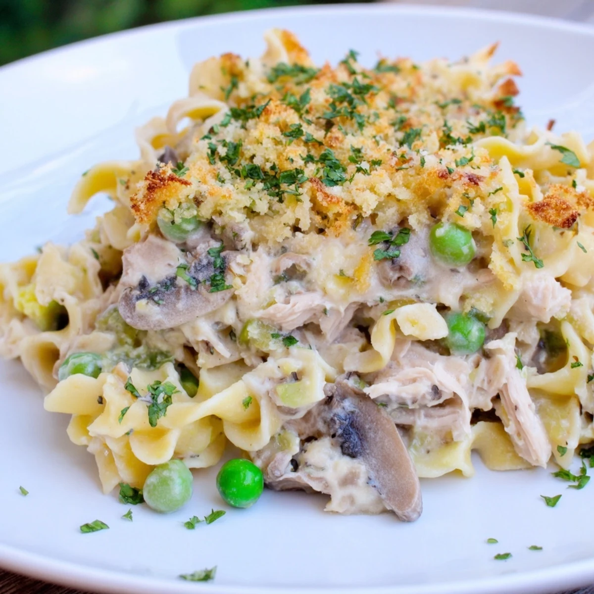 Golden, bubbly Tuna Noodle Casserole with a crispy topping, ready to serve and enjoy.