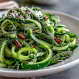 Elegant shaved asparagus with lemon and Parmesan, a light Mediterranean side dish featuring bright flavors and delicate Parmesan shavings.