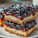 Sweet and tart blackberry lemon bars, a perfect dessert with flaky shortbread crust.