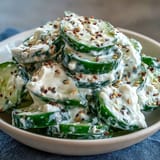 Creamy Viral Cucumber Salad with Everything Bagel topping, a refreshing summer side.
