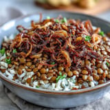Levantine Mujadara: fluffy rice and lentils topped with golden crispy onions.