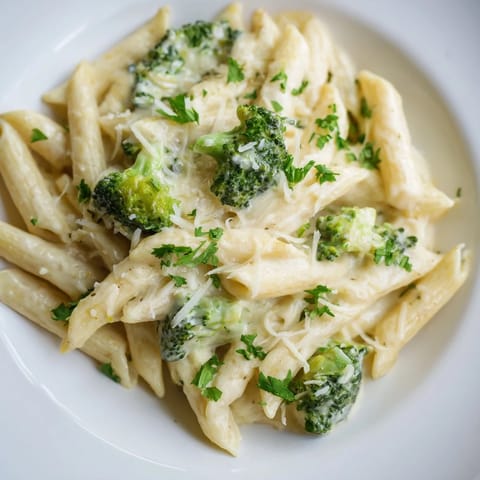 This creamy Cream Cheese Garlic Pasta is tossed with Parmesan and garnished with fresh parsley.