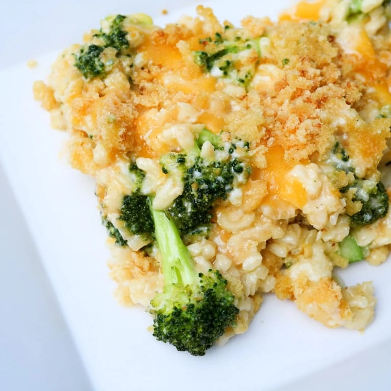 A creamy, cheesy portion of Cheesy Broccoli and Rice All-in-One Bake; perfect for a family dinner.