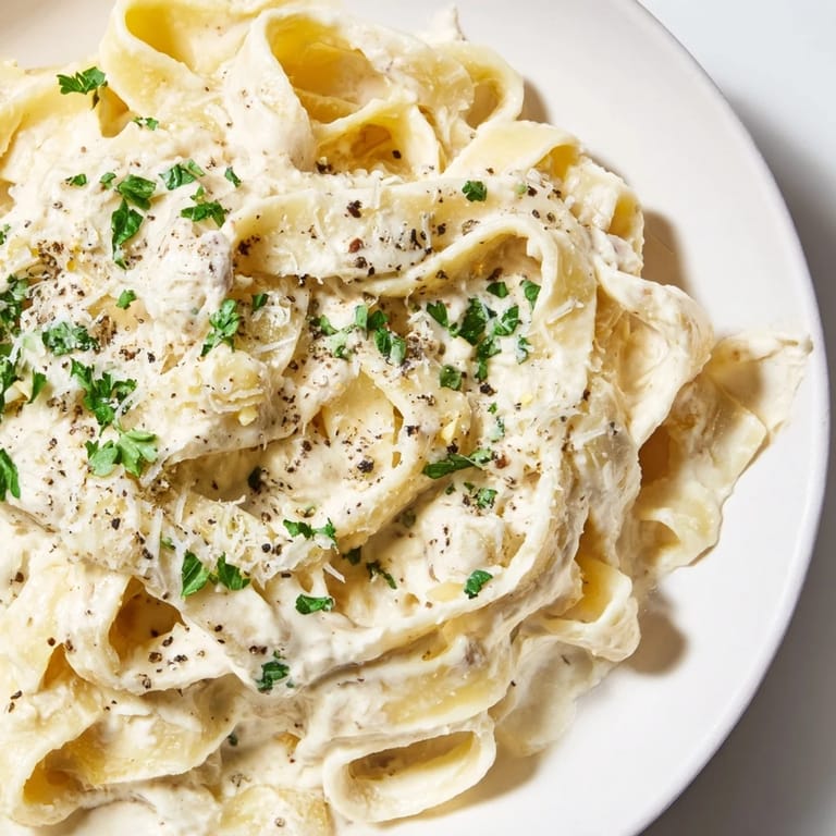 Silky, smooth Pasta Alfredo Cottage Hack recipe, easy to visualize as a comforting vegetarian meal.