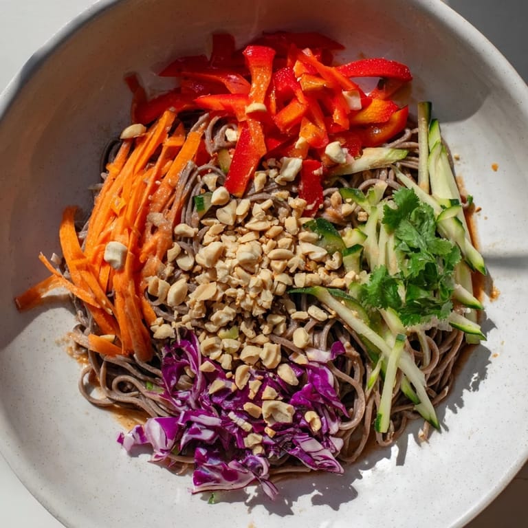 Beautiful bowl of Cold Noodle Salad with peanuts, ready to enjoy as a light, flavorful meal.